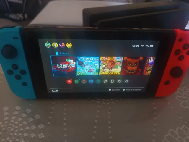 Nintendo Switch + Cargador y Accesorios