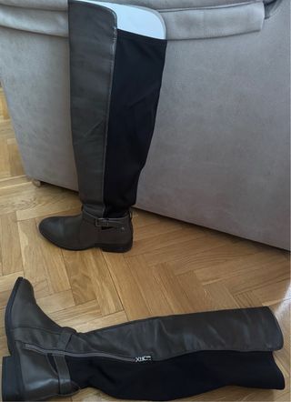 Botas altas de piel marrones y negras