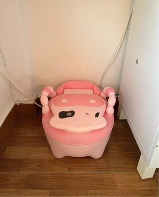 Orinal infantil rosa con diseño de vaca