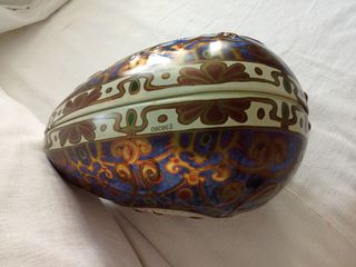 Uovo decorativo vintage in metallo