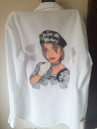 Blusa Bikatelier Talla M con estampado " Zona de M