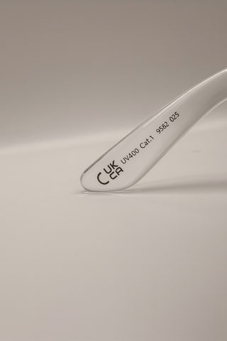 Gafas transparentes con lentes verde-amarillo