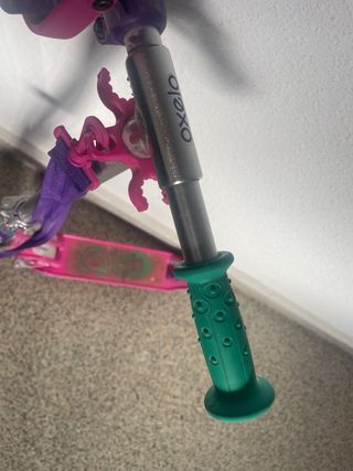 Patinete Oxelo rosa y morado