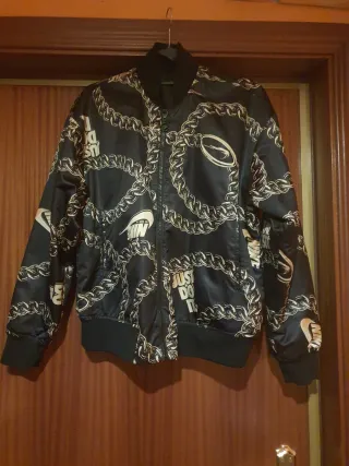 Chaqueta Nike Mujer Negra y Dorada