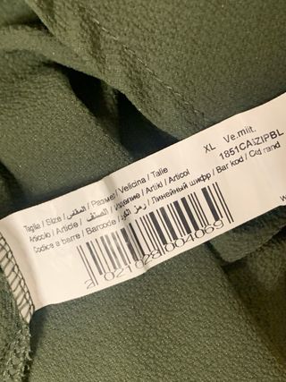 Blusa verde con cerniera