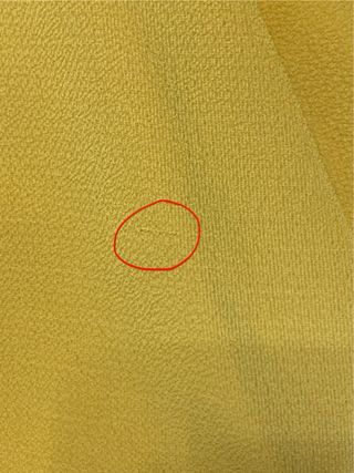 Blusa gialla con zip