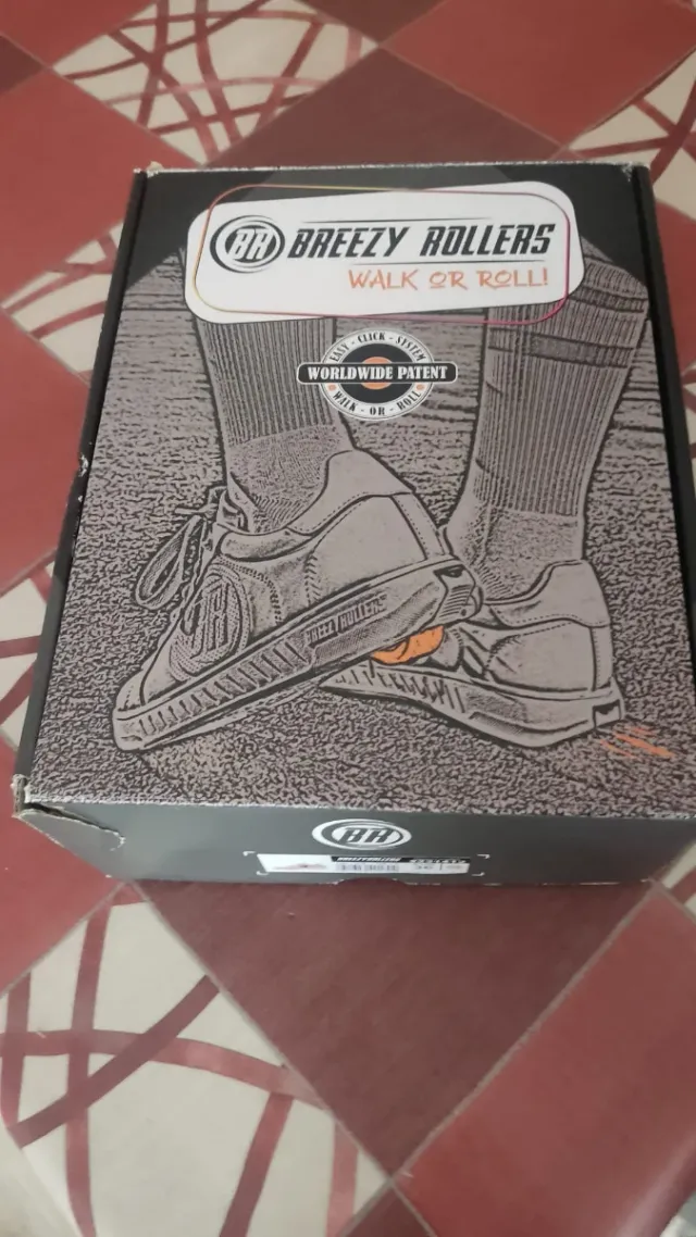 Zapatillas con ruedas rosas y estrella roja