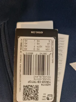 Polo Adidas azul con rayas blancas