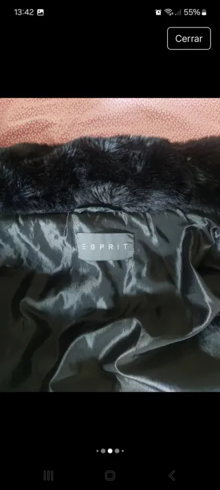 Plumífero negro con cinturón