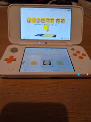 New Nintendo 2DS XL Bianca e Arancione