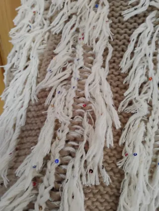 Jersey de punto con flecos