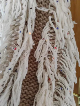 Jersey de punto con flecos