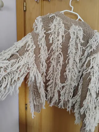 Jersey de punto con flecos