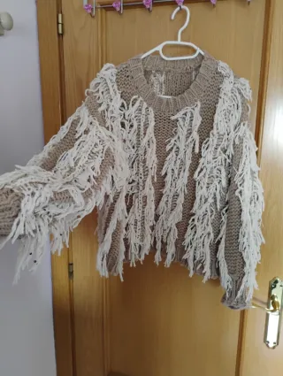 Jersey de punto con flecos