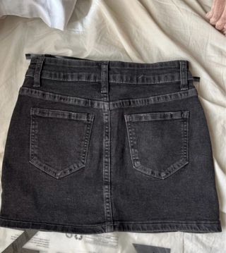 Falda vaquera negra corta Talla XS