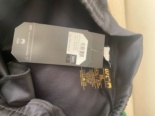 Pantalones deportivos Venum UFC Negro/Dorado