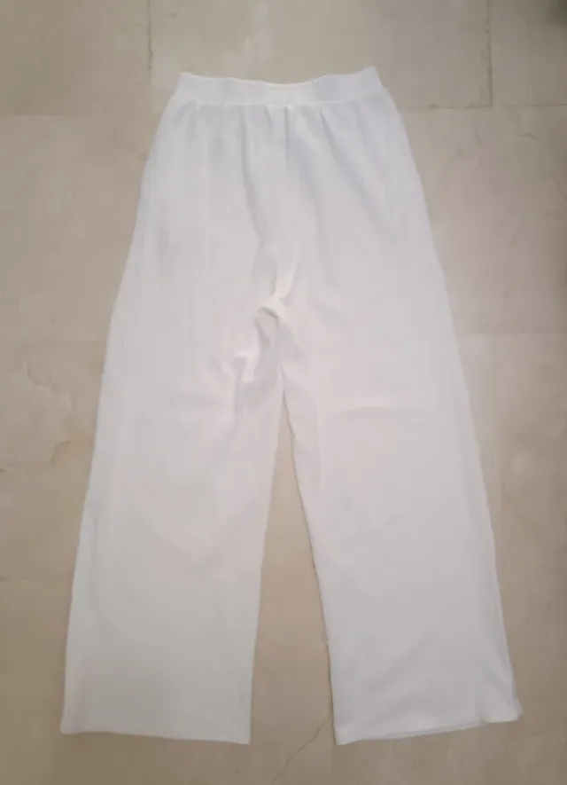Pantalones anchos blancos mujer