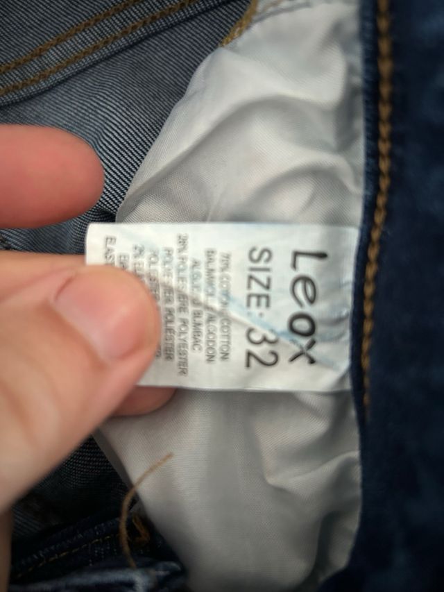 Jeans uomo blu strappati taglia 42