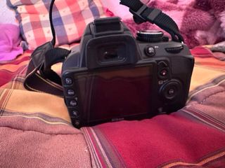 Cámara Nikon D3100 + Cargador MH-24