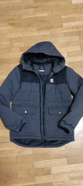 Cazadora acolchada gris y negra de niño