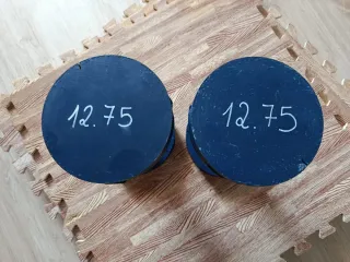 Mancuernas 12.75 kg precio por unidad.