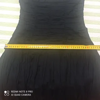 Vestido midi negro Mango. LEER