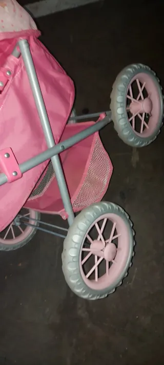 Cochecito de muñecas rosa