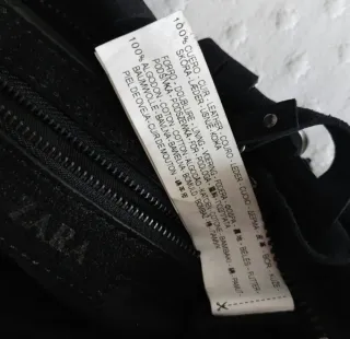 Bolso piel tachuelas flecos