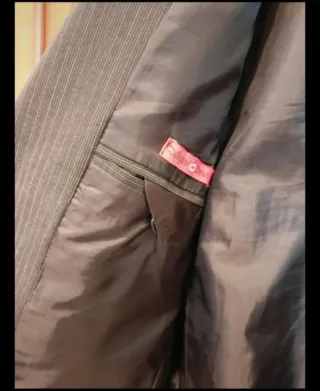 Giacca uomo nera con dettagli bianchi