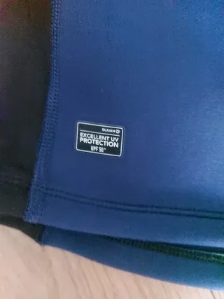 Camiseta neopreno OLAIAN azul/negra. Edad 8-10