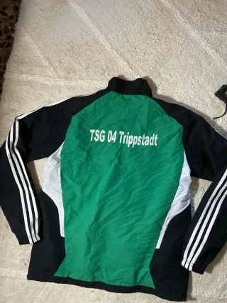 Chaqueta deportiva Adidas verde y negra