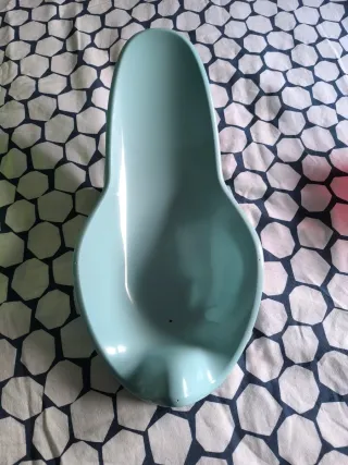 Bañera plegable verde y asiento para bebe