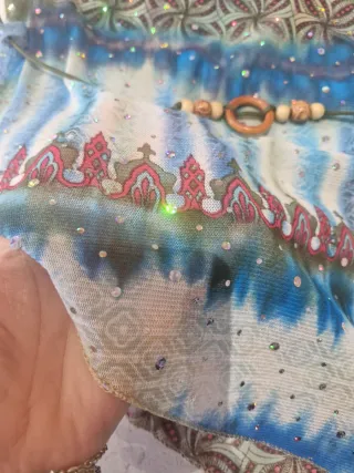 Top brillo halter cuello