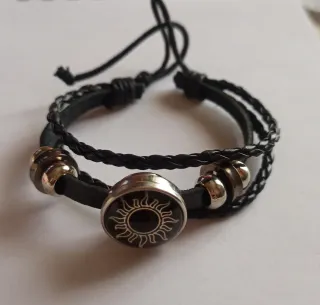 Pulsera bisutería de cuero trenzado con sol