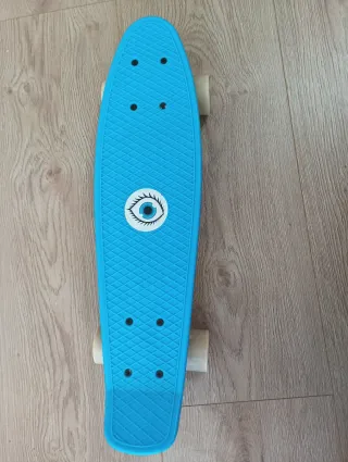 Monopatín azul Decathlon mini para niños