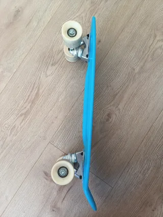 Monopatín azul Decathlon mini para niños