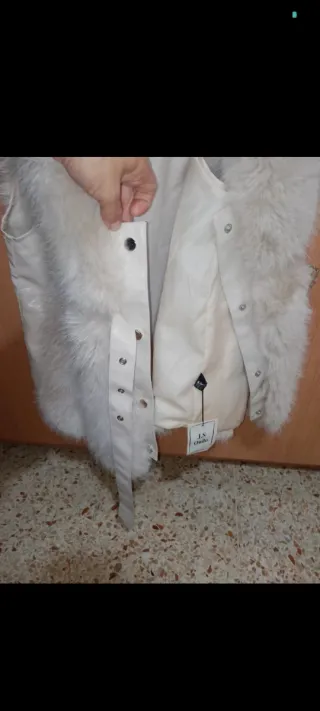 Abrigo pelo sintético elegante