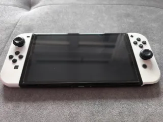 Nintendo Switch OLED Bianca + Giochi + accessori