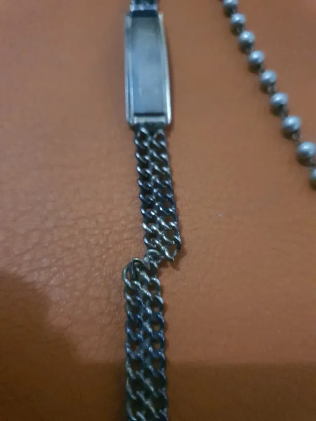 Rosario d'argento e braccialetto