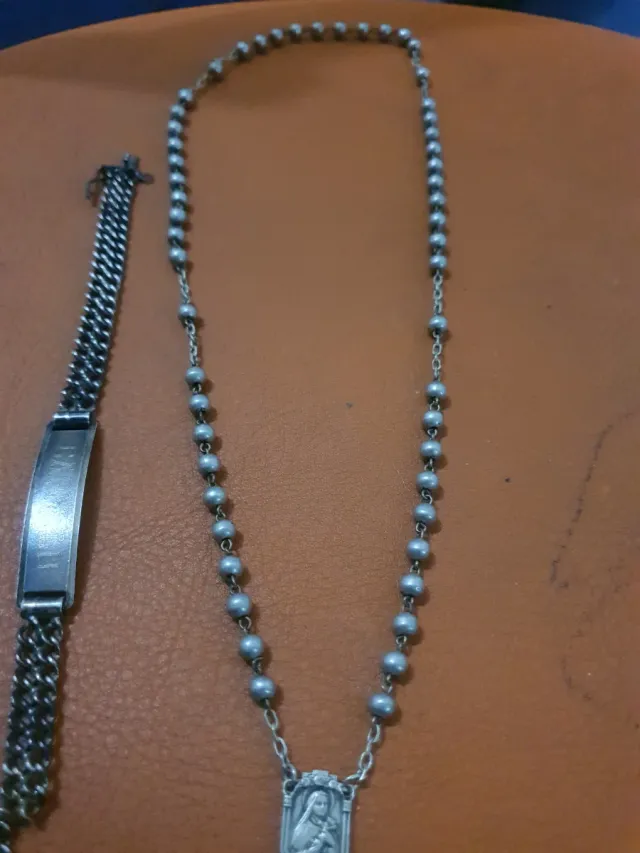 Rosario d'argento e braccialetto
