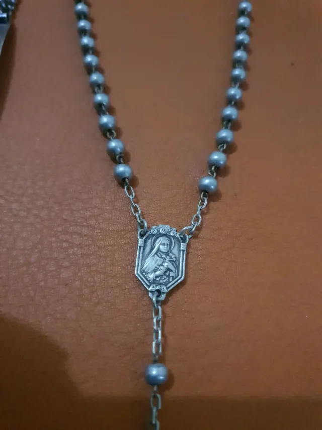 Rosario d'argento e braccialetto