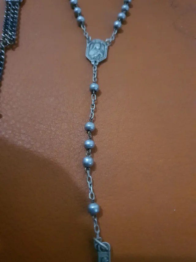 Rosario d'argento e braccialetto