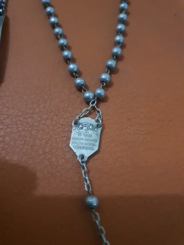 Rosario d'argento e braccialetto