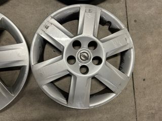 Juego 4 Tapacubos Nissan en 16 pulgadas