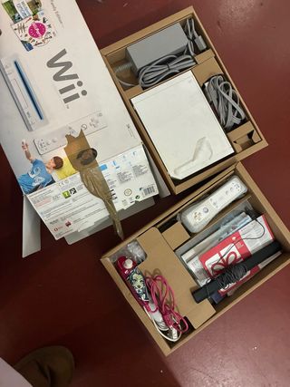 Nintendo Wii con juegos y mandos personalizados