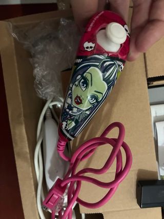 Nintendo Wii con juegos y mandos personalizados