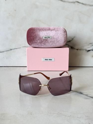 Gafas de sol Miu Miu moradas y doradas