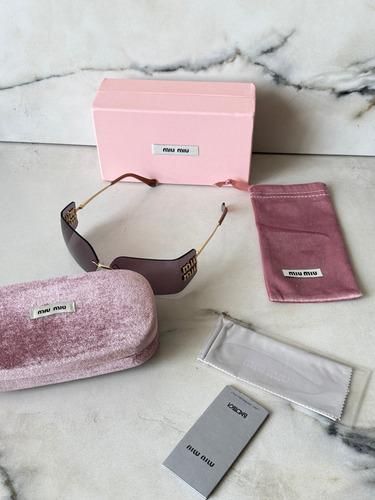 Gafas de sol Miu Miu moradas y doradas