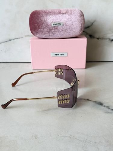 Gafas de sol Miu Miu moradas y doradas