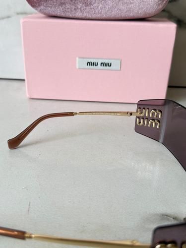 Gafas de sol Miu Miu moradas y doradas